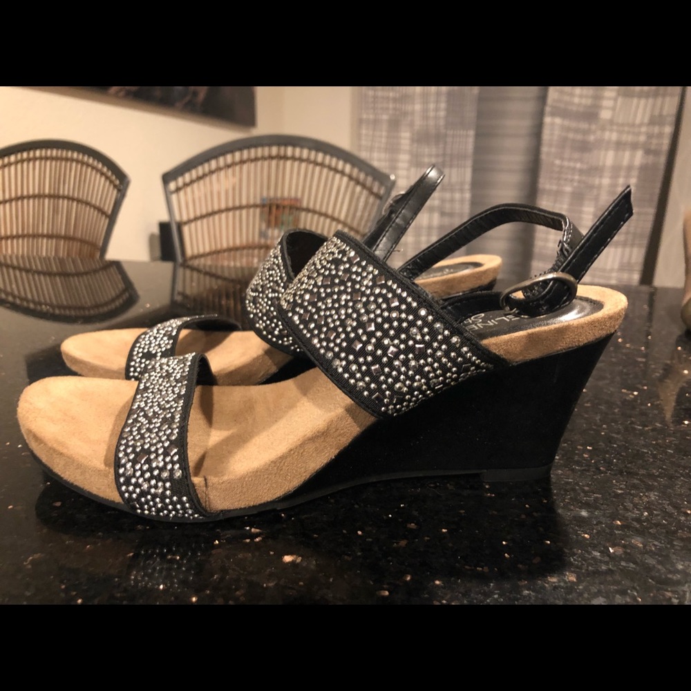 Black wedge sandals.